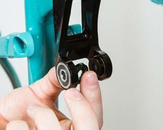 Tighten the pivot axle using a 10mm hex wrench.