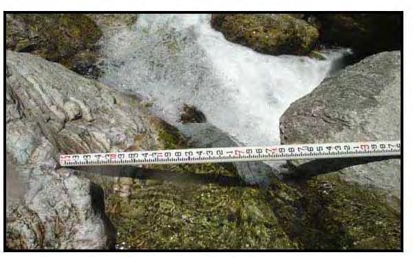 Assessment of Fish Upstream Migration at Natural Barriers in the Upper Alameda Creek Sub-Watershed Finally, it is noted that the landing at the top of the falls (Figure 4-8) is a chute (with a water