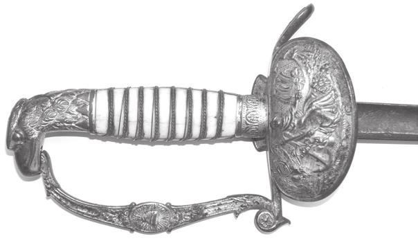 Pennsylvania). Figure 13. (Sword 6) Guard showing eagle, anchor and ship. Figure 14.