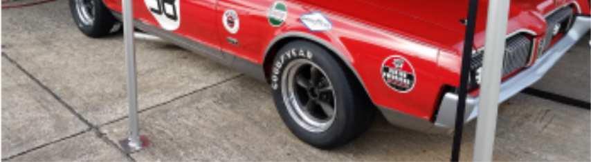 The red 1967 Cougar #98BM was built and driven by Parnelli Jones and Dan Gurney.
