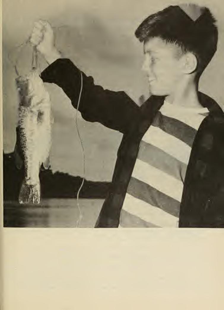 A 3.1 pound bass and its captor.