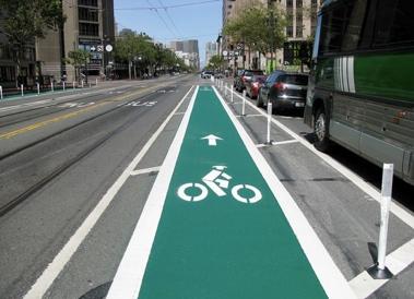 Colored lanes are actually colored asphalt (as opposed to paint) that help visually claim the space for bicyclists and remind motorists of bicycles right to share the road.