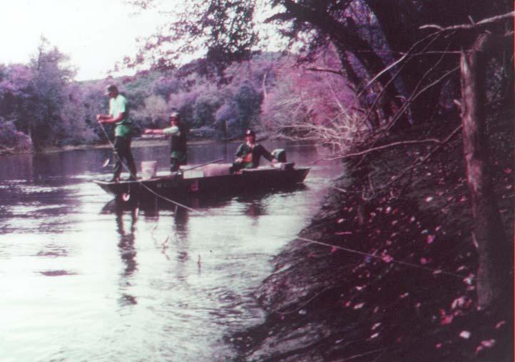 After the fish are removed from the trot line the boat is at the downstream end of the line.