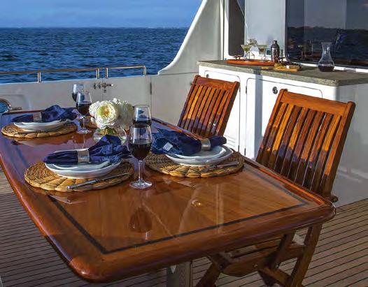 $1510 $1960 Dining on the aft deck affords overhead protection from sun and inclement weather but with the advantage of an unobstructed view.