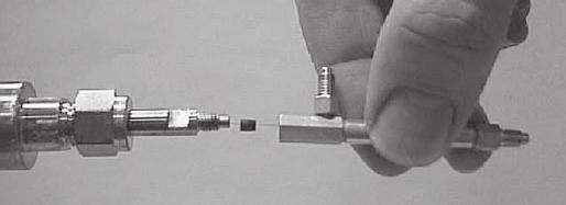 into ionizer. Figure 7. Restrictor is sealed within adapter with end protruding.
