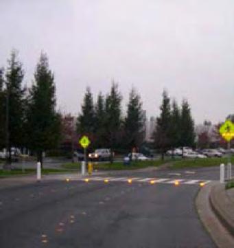 The purpose of the In-Roadway Warning Light enhanced crosswalk system and associated signage is for safety purposes (Refer to Exhibit 1).