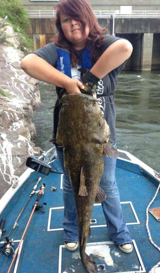 - no ethanol * Live Bait * Worms * Beer * Ice * Lottery * Propane * Minnows Mini Me wrestled this big catfish in below Watts Bar Dam. Photo courtesy Watts Bar Bait & Tackle.
