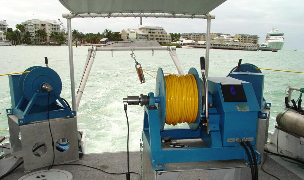 A view of Lakota s back deck with magnetometer cables and reels during the Key West Harbor survey December 2003 Survey Methods: The 48-foot, aluminum-hulled R/V Lakota was used to tow an array of
