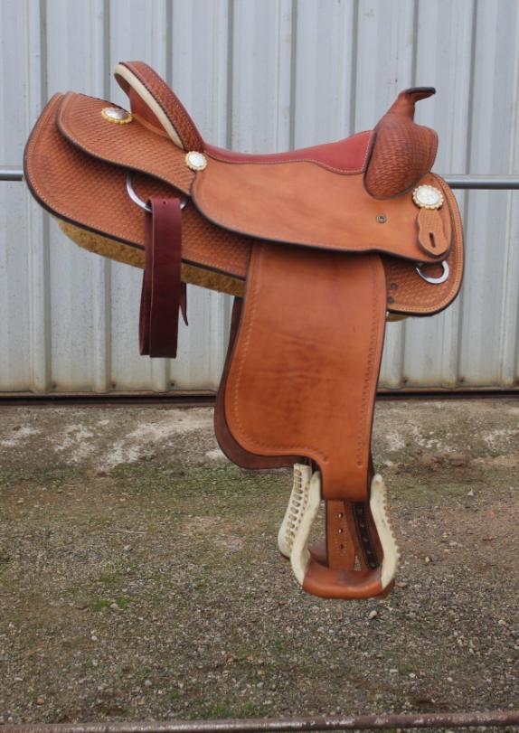 Suede seat and cowhide stirrups.