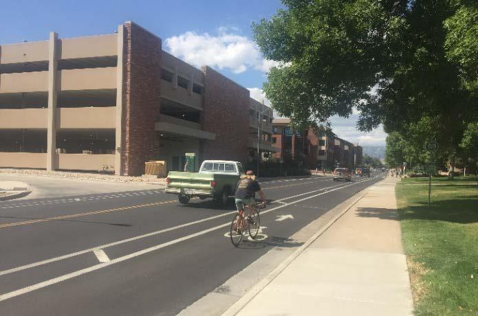 Bike lanes are typically located on both sides of the road and carry bicyclists in the same direction as adjacent motor vehicle traffic.