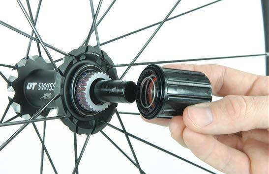 Servicing the Freewheel System 6. Slide the second spring with the big diameter into the rotor. 7.
