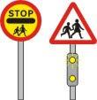 School crossing patrol The flashing lights on the warning sign inform drivers that a