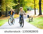 Prompt Jeremy and Jack ride to school to build up their endurance for soccer tryouts. Jaqui and Judy also ride their bikes because they are trying out for cheerleading and need to get into condition.