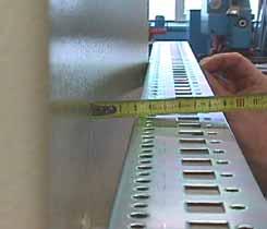 Figure 13 shows such a check during a pressure test on a non-reinforced door. The door displacement at 20mbar underpressure is 30 mm (800 mm wide door in this instance)!