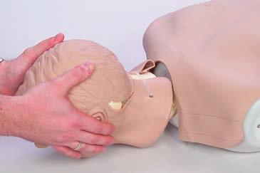 Figure 4 Figure 3 B. Attaching the Head to the Manikin 1. Nasco s Airway Management Trainer head has the ability to be attached to CPARLENE and any of the Resusci Anne * brand CPR manikins. 2.