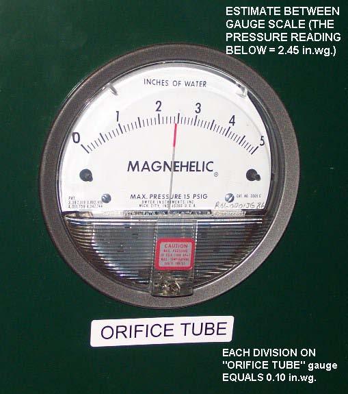 Determining the Leakage Rate Now that you have obtained the system test pressure and have the inlet damper locked in position, note the pressure reading of the ORIFICE TUBE gauge (Figure 15).