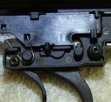 If the modular trigger will not come out after the pin has been removed, then reinstall the cross pin.