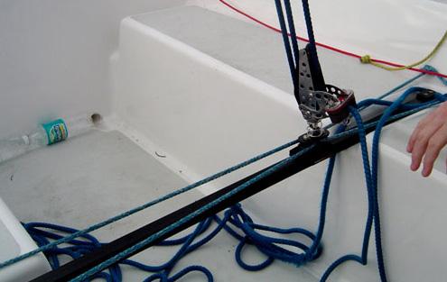 In these conditions the Vang is tensioned quite hard to control leech tension. (See heavy air technique). Use the outhaul for balance.