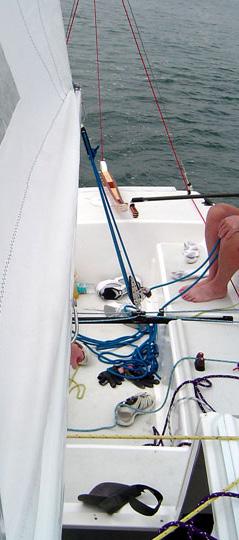 A tighter outhaul flattens the lower sections of the main, which helps to minimize your windward helm and reduce drag.
