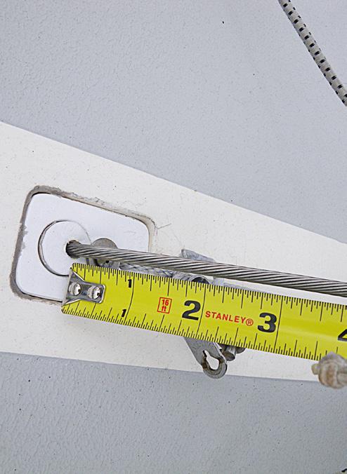Reconnect the forestay and set the rake up at a distance of 48 measured from the black band mark down to the deck following  From BASE, in