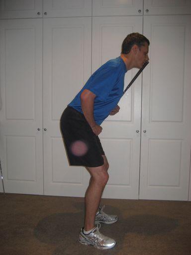 The following procedure is the best way to get into correct golf posture, with activation of the