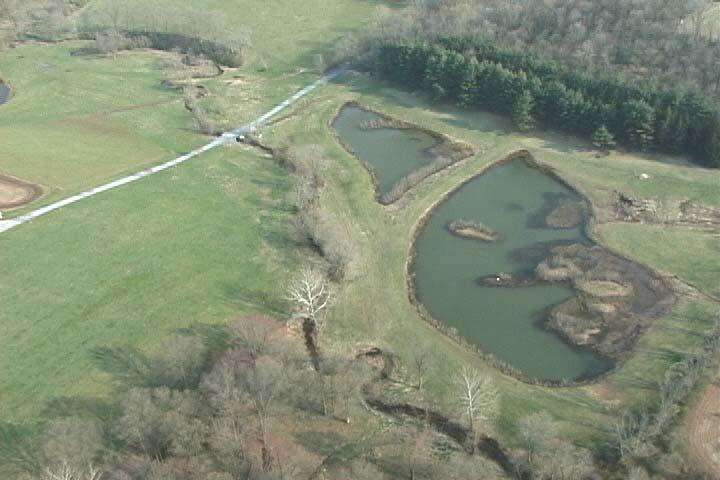 Photos #27 and #28 Aerial photo #27 shows two man made wetlands on Hopeland Farm (Tract #59).