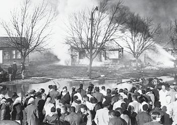 Four minutes into the flight it plunged into an African-American neighborhood in north Wichita, sending a torrent of fuel and fire into homes.