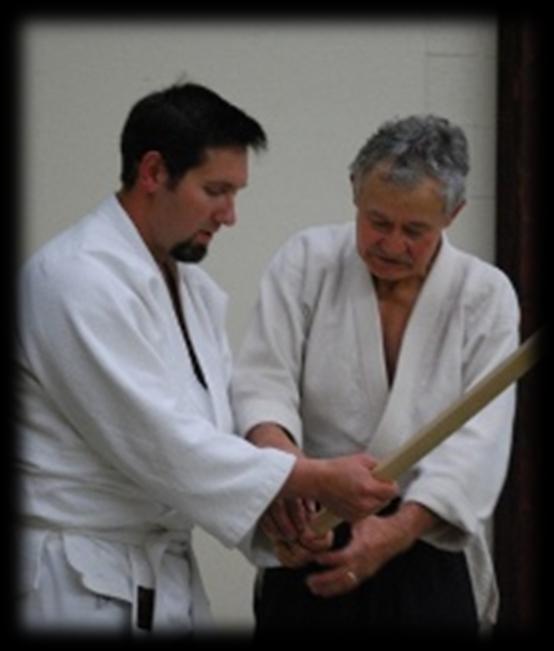 Aikido DOJO Etiquette and Class Protocol SHOMEN NI REI The instructor may then say, SHOMEN NI REI or simply REI. This means bow to the front.