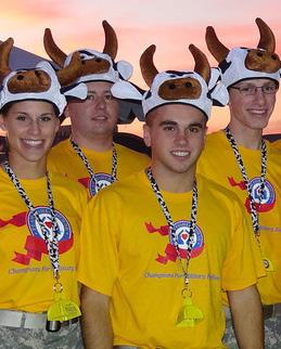 HOUSE VOLUNTEERS GET NOTICED WEARING THESE COW HATS ALONG THE RACE COURSE WHEN TEAM MEMBERS SEE