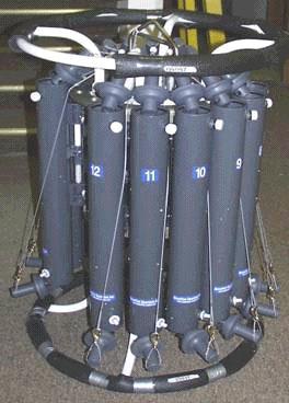 The water sampling package consists of: water sample bottles with their lanyards trigger mechanism upper and lower pylons that hold the bottle on the frame upper