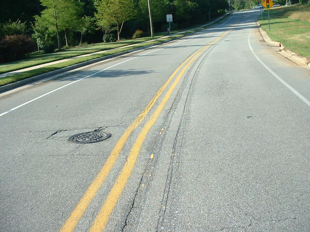 After In late 2012, the striping was changed on the southern portion near Homestead Road and a southbound bike lane was added. Notice the old centerline markings.