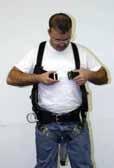 The shoulder strap retainer (chest strap) must be positioned in the mid-chest area