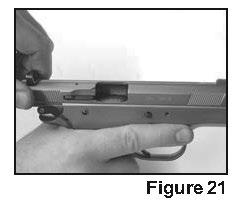 1) With the gun pointed in a safe direction. Move the safety to the off position if the hammer is in the down position or resting position.