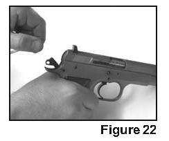 Pull the slide rearward until it cannot travel any farther. See Figure 21.