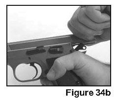 8) Insert the loaded magazine into the pistol.