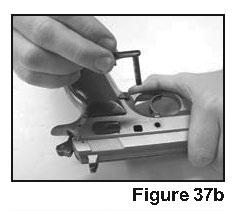 Pull the slide back slightly and line up the two marks. See Figure 36.