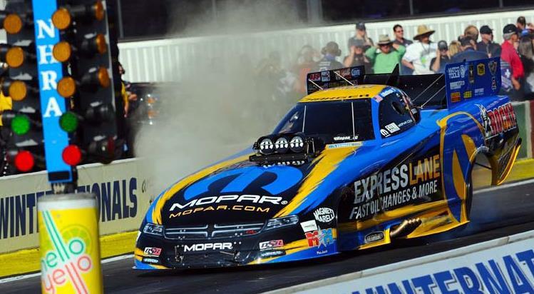Bill Haskins gets a traditional Mello Yello shower from his Mopar/Rocky teammates after earning his first NHRA event title at the Winternationals.