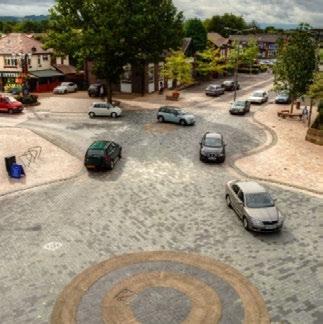 Shared Space Roundels Similar to a roundabout, a shared space roundel is a round intersection; however, they have no center island and no dedicated right of way given to any traffic movement at any
