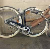 Start by carefully removing the bicycle and any loose items that may be