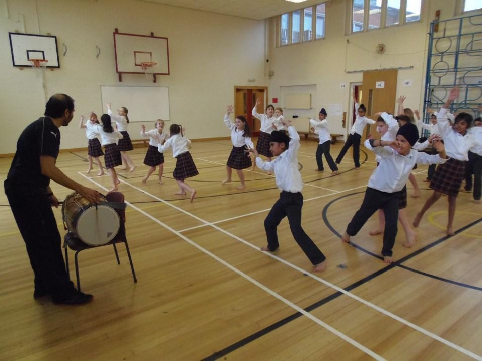 It began with the children finding the beat, dancing, moving and clapping with a Dhol drum.
