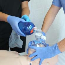 A B C Figure 6 ADULT BAG-MASK VENTILATION IN TWO-RESCUER CPR If two people are present and a bag-mask device is available, the second