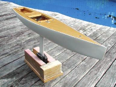 When dry, mask the newly polyurethaned deck with a mm (/in) underlap, making corners with special masking tape techniques. rudder plug to stop paint from getting into the rudder stock.