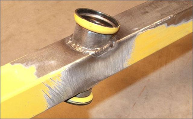 straight through the frame at 90 degrees. When using the round file, it is easy to file away both side of the frame at the same time, so you can keep the gap to a minimum for a better weld.