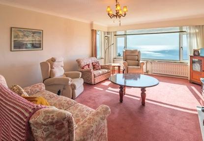 The kitchen enjoys dual aspects over the sea and along the coast to St Anthony Head. An adjoining dining room provides an excellent place to entertain, with windows the full width of the seaward side.