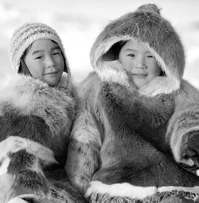 The Inuit: Northern Living Photo Credits: Front cover, back cover, title page, pages 6, 8, 9, 10, 11, 12, 14, 15, 16, 18: Bryan and Cherry Alexander; page 5: Ken Madsen/The Wilderness Society.