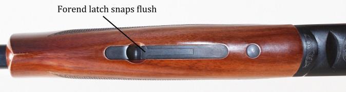 The forend latch will sit flush if the forend is seated correctly, as in figure 15. Figure 15 Loading your Shotgun: 1. Put the safety in safe mode, with the S showing. 2.