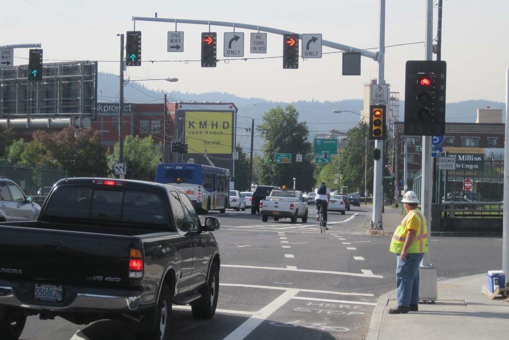 N Broadway St & N Williams Ave Thru green arrows Improvements PTR Bike signal