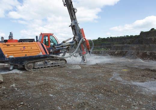 Bunded Edge Protection Drill Rig Operator working at a Quarry Face