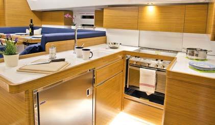 The spacious U-shaped galley can offer all the comforts from home to include the cooker