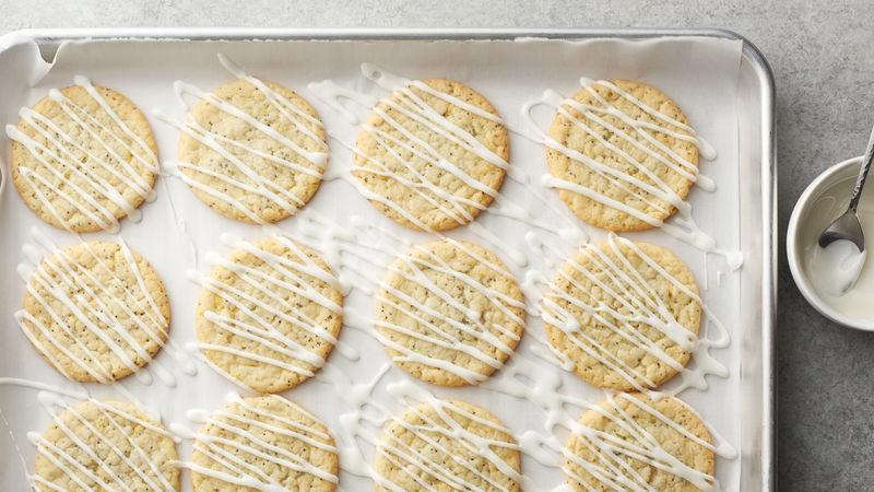 5oz Refrigerated Sugar Cookie Dough 2 T Grated Lemon Peel 2 Tsp Poppy Seeds 1 Cup Powdered Sugar 1 2 tsp lemon juice 350 Oven...Line cookie sheets with parchment paper.